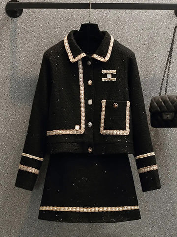 Olusola tweed skirt set.